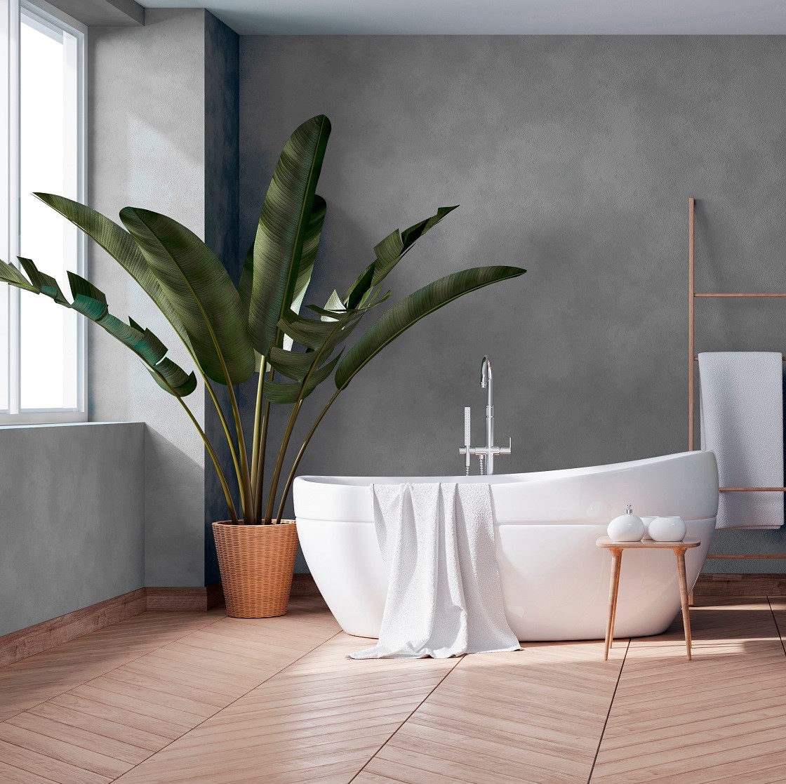 amplio baño con paredes microcemento gris
