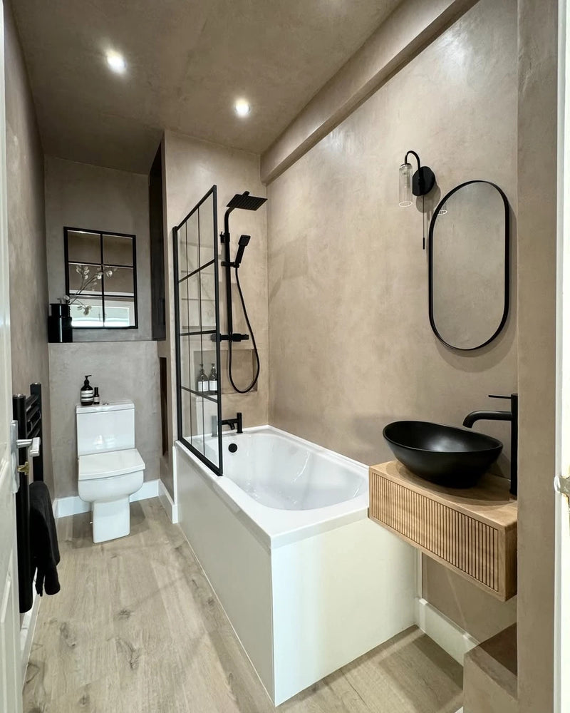 The bathroom of @jade.doutch: microcement walls, after