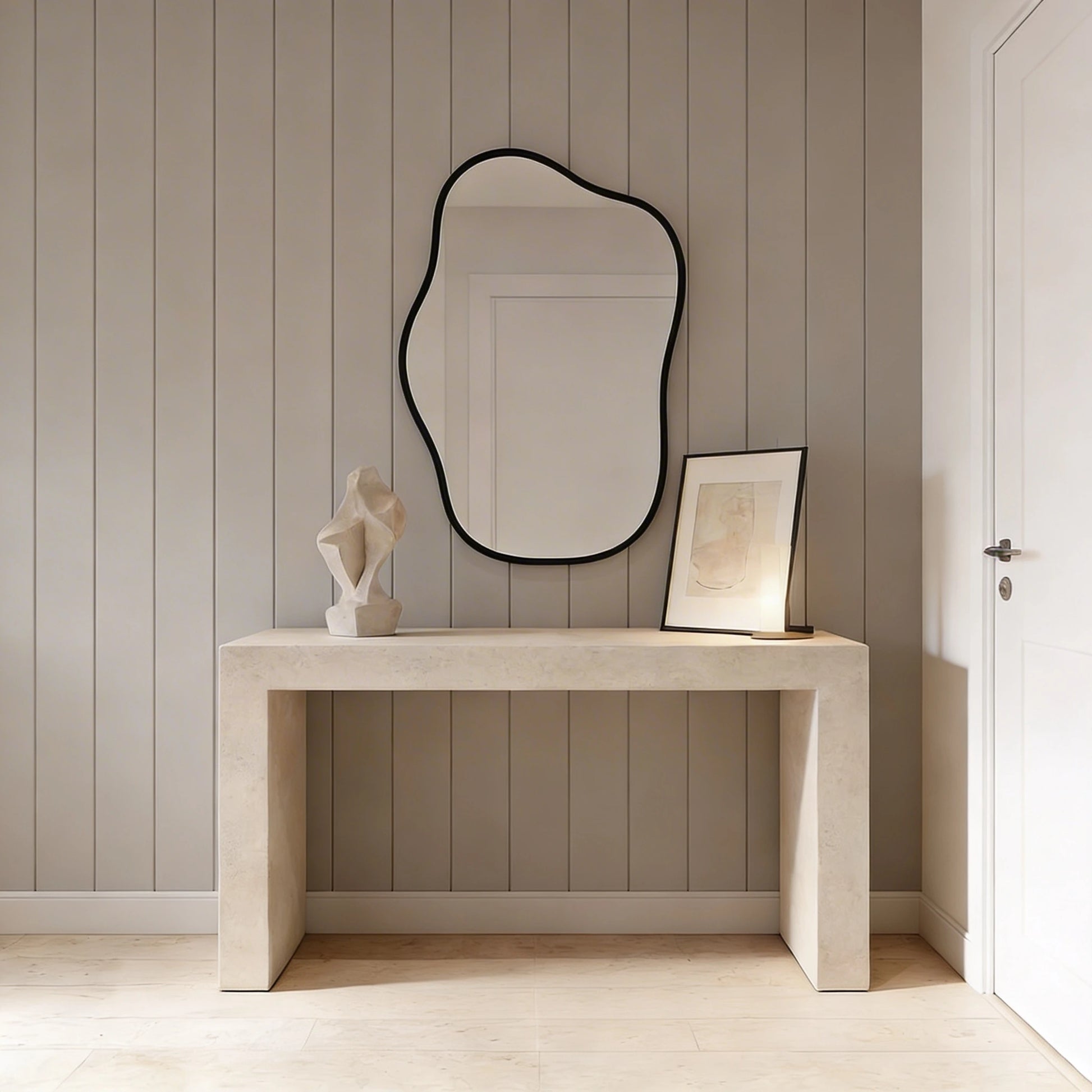 Aparador de microcemento en color Blanco Roto en un recibidor minimalista con panelado vertical en pared y madera en suelo. 