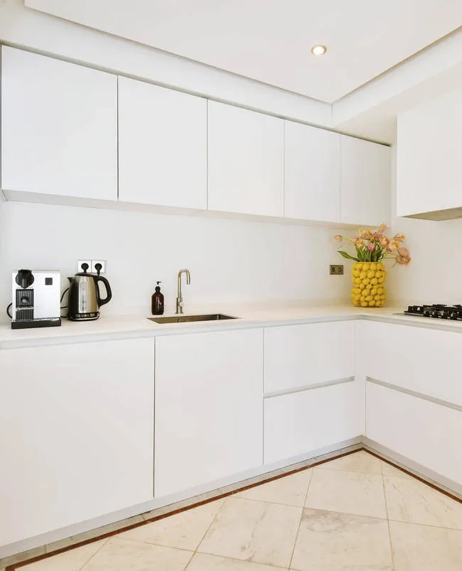 Kitchen decorated with white furniture