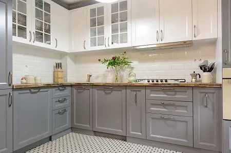Kitchen renovation with white painted tiles