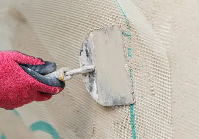 Application of microcement with mesh