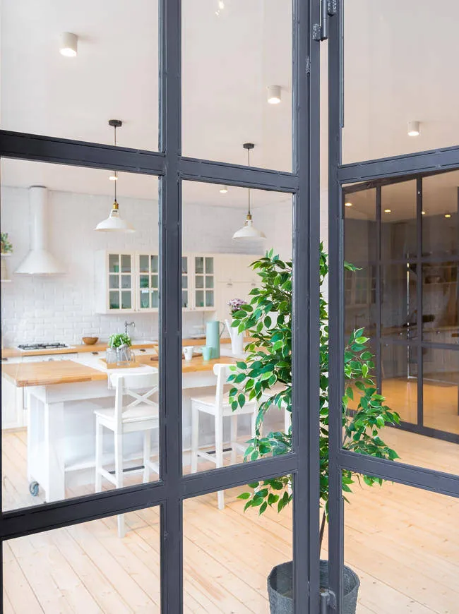 Kitchen with glass partition wall
